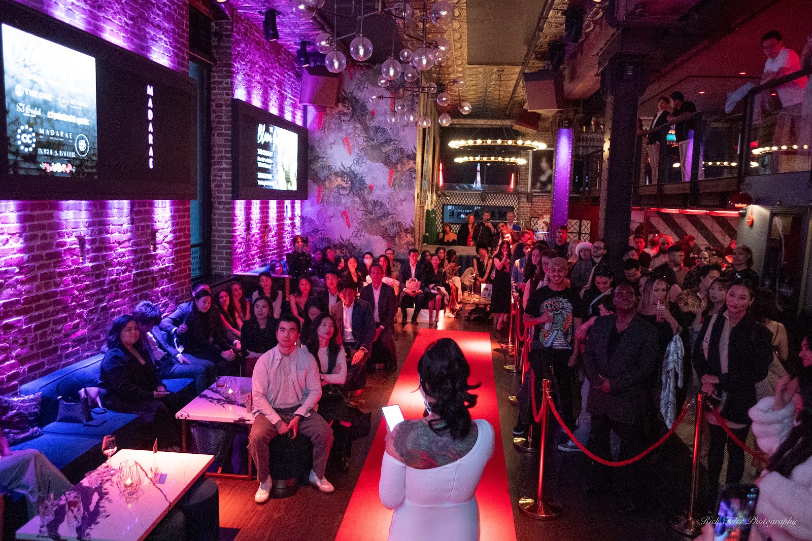 Seated audience along the runway before the show